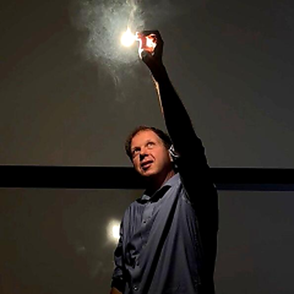 Christopher Pochas teaching with a demonstration.